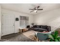 Cozy living room features a neutral palette with modern furnishings and plenty of natural light at 461 W Holmes Ave # 350, Mesa, AZ 85210