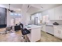 Bright and modern kitchen with white cabinets and stainless steel appliances at 11333 N 92Nd St # 1118, Scottsdale, AZ 85260