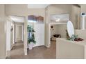 Bright foyer features high ceilings and tile flooring, with views into the living room at 1144 E Nunneley Rd, Gilbert, AZ 85296