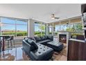 Comfortable living room features a fireplace, large windows offering an abundance of natural light and scenic views at 120 E Rio Salado E Pkwy # 102, Tempe, AZ 85281