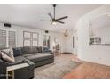 Inviting living room with wood floors, a comfortable sectional, and stylish decor at 1282 N Banning St, Gilbert, AZ 85234