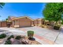 Charming single-story home with a well-manicured front yard and a two-car garage in a desirable location at 1865 E Locust Pl, Chandler, AZ 85286