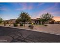 Charming front exterior featuring meticulously maintained landscaping and a welcoming entrance at 26204 S Washington St, Chandler, AZ 85249