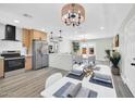 Open dining area with modern decor connecting the kitchen and living space, great for entertaining at 5236 S 19Th Ave, Phoenix, AZ 85041