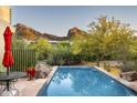 Inviting pool area with mountain views, perfect for relaxation and outdoor entertainment at 6306 N Camelback Manor Dr, Paradise Valley, AZ 85253