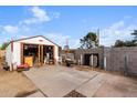 Spacious backyard with a shed, offering ample storage and potential for customization and landscaping projects at 7502 W Cora Ln, Phoenix, AZ 85033