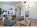 Spacious living room with comfortable seating, stylish decor, and bright natural light at 1807 W Canary Way, Chandler, AZ 85286