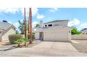 Charming home featuring manicured landscaping, a two-car garage, and a welcoming front entrance at 3389 W Barcelona Dr, Chandler, AZ 85226