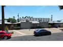 Front exterior of a single-story house with desert landscaping and street parking at 411 W Colter St # A, Phoenix, AZ 85013