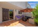 Relaxing patio features comfortable seating, stylish decor, and convenient access to the indoors at 4918 N 74Th St, Scottsdale, AZ 85251