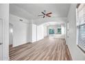 Bright, open-concept living space with sleek wood floors and modern architectural details at 5125 E Juana Ct, Cave Creek, AZ 85331