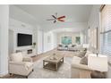 Inviting living area with neutral decor, wood floors, and ample natural light at 5125 E Juana Ct, Cave Creek, AZ 85331
