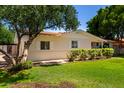 Delightful residence with a well-kept yard and established trees, providing a comfortable setting at 606 W 15Th St, Tempe, AZ 85281