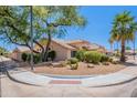 Charming home on a corner lot with mature trees and lush landscaping at 7345 E Forge Ave, Mesa, AZ 85208