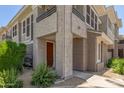 A charming front door with desert landscaping and a gas meter at 15221 N Clubgate Dr # 2139, Scottsdale, AZ 85254