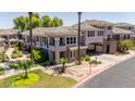 Condo building with desert landscaping and a convenient covered parking spot at 15221 N Clubgate Dr # 2139, Scottsdale, AZ 85254