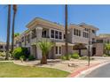Condo building with desert landscaping and covered parking at 15221 N Clubgate Dr # 2139, Scottsdale, AZ 85254