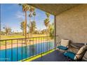Relax on the balcony overlooking tranquil water and a scenic golf course at 2524 S El Paradiso -- # 17, Mesa, AZ 85202