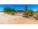 Landscape view showing the desert-style setting and attractive curb appeal at 3614 W Phillips Rd, San Tan Valley, AZ 85144