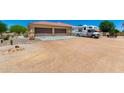 Attached two-car garage and RV Parking on a large lot at 3614 W Phillips Rd, San Tan Valley, AZ 85144