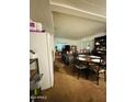 Open-plan living space offers combined living and dining, ready to be refreshed with new decor at 5601 W Missouri Ave # 63, Glendale, AZ 85301