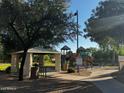 Community playground and picnic area for residents to enjoy at 876 S Colonial Dr, Gilbert, AZ 85296