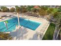 Large community pool with lap lanes, lounge chairs and covered seating area at 15668 W Pershing St, Surprise, AZ 85379