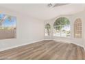 Bright living room with hardwood floors and plenty of natural light at 20961 N 96Th Dr, Peoria, AZ 85382