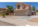 Charming two-story home with a two-car garage and well-maintained landscaping at 2438 S Chestnut Pl, Chandler, AZ 85286