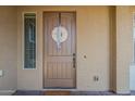 Inviting front door with tan accents and a decorative wreath at 3925 E Elmwood St, Mesa, AZ 85205