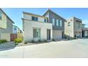 Charming two-story home with a two-car garage and low-maintenance landscaping at 4927 S Tune --, Mesa, AZ 85212