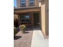 Front porch with desert landscaping and covered entryway at 10335 W Pima St, Tolleson, AZ 85353
