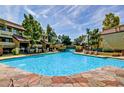 Resort-style pool area offering clear, blue water and a relaxing atmosphere for residents to enjoy in a community setting at 1331 W Baseline Rd # 167, Mesa, AZ 85202