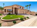 Charming two-story home with three-car garage and desert landscaping in a well-maintained neighborhood at 15229 S 18Th Dr, Phoenix, AZ 85045