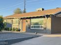 Cozy single-story home with neat landscaping and charming curb appeal at 1801 N 87Th Pl, Scottsdale, AZ 85257