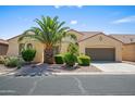 Inviting single-story home with well-maintained landscaping and desert features on a sunny day at 2163 N 164Th Dr, Goodyear, AZ 85395