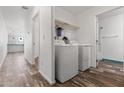 Well-equipped laundry room with modern washer and dryer hookups and ample shelving at 701 S Dobson Rd # 447, Mesa, AZ 85202