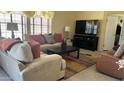 Cozy living room with comfortable seating, a modern TV, and a stylish rug at 11596 W Sierra Dawn Blvd # 247, Surprise, AZ 85378