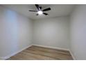 Bright bedroom with a ceiling fan and modern flooring at 16447 W Cottonwood St, Surprise, AZ 85388