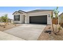 Charming single-story home with a two-car garage and low-maintenance landscaping at 17830 W Mission Ln, Waddell, AZ 85355