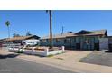 Delightful single-story home with a well-kept front yard and convenient driveway at 4810 N 69Th Dr Dr, Phoenix, AZ 85033