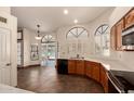 Bright kitchen features wood cabinets, white countertops, stainless appliances, and tile flooring at 608 E Stonebridge Dr, Gilbert, AZ 85234