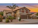 Inviting two-story home features well-manicured landscaping and an attached three car garage at 630 W Saragosa St, Chandler, AZ 85225