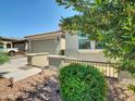 Charming house featuring desert landscaping, a wide driveway, and a welcoming front entryway at 8140 W Lane Ave, Glendale, AZ 85303