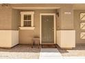 Charming entryway featuring a covered porch and neutral-toned door at 9233 E Neville Ave # 1127, Mesa, AZ 85209