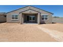 Large backyard featuring an outdoor covered patio and plenty of space for entertaining at 37194 W La Paz St, Maricopa, AZ 85138