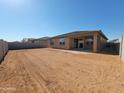 Large, blank canvas backyard, perfect for creating your dream outdoor living space at 37212 W Parador Ln, Maricopa, AZ 85138