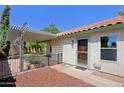 Cozy backyard with a covered patio, a well-kept garden, and a private entrance at 5902 E Juniper Ave, Scottsdale, AZ 85254