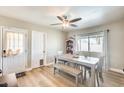 Cozy dining area with a modern table, chairs, and bench seating, perfect for Gathering meals at 856 N Evergreen St, Chandler, AZ 85225