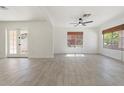 Bright, open living room featuring tile floors, neutral walls and large windows, creating an airy atmosphere at 1510 W Fillmore St, Phoenix, AZ 85007